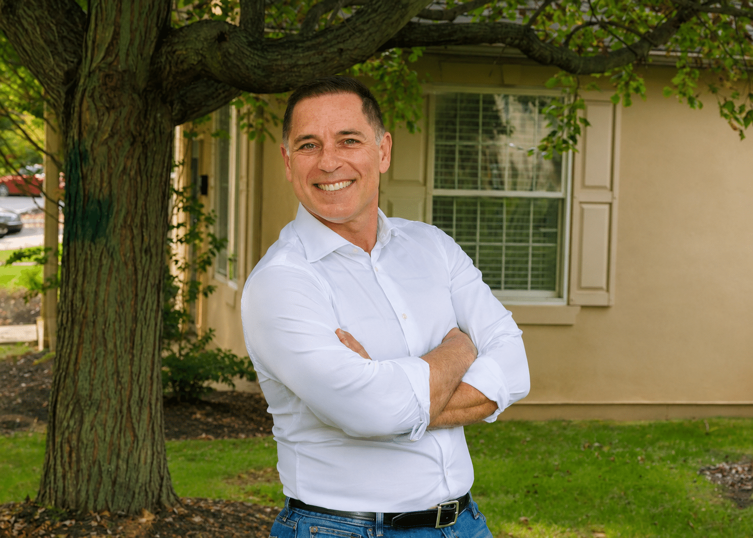 Portrait of Dr. Kadan smiling outdoors, showcasing the friendly and patient-focused care provided at our orthodontic practice
